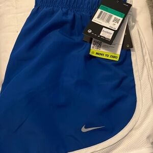 Nike new with tags. Polyester..Royal blue with white